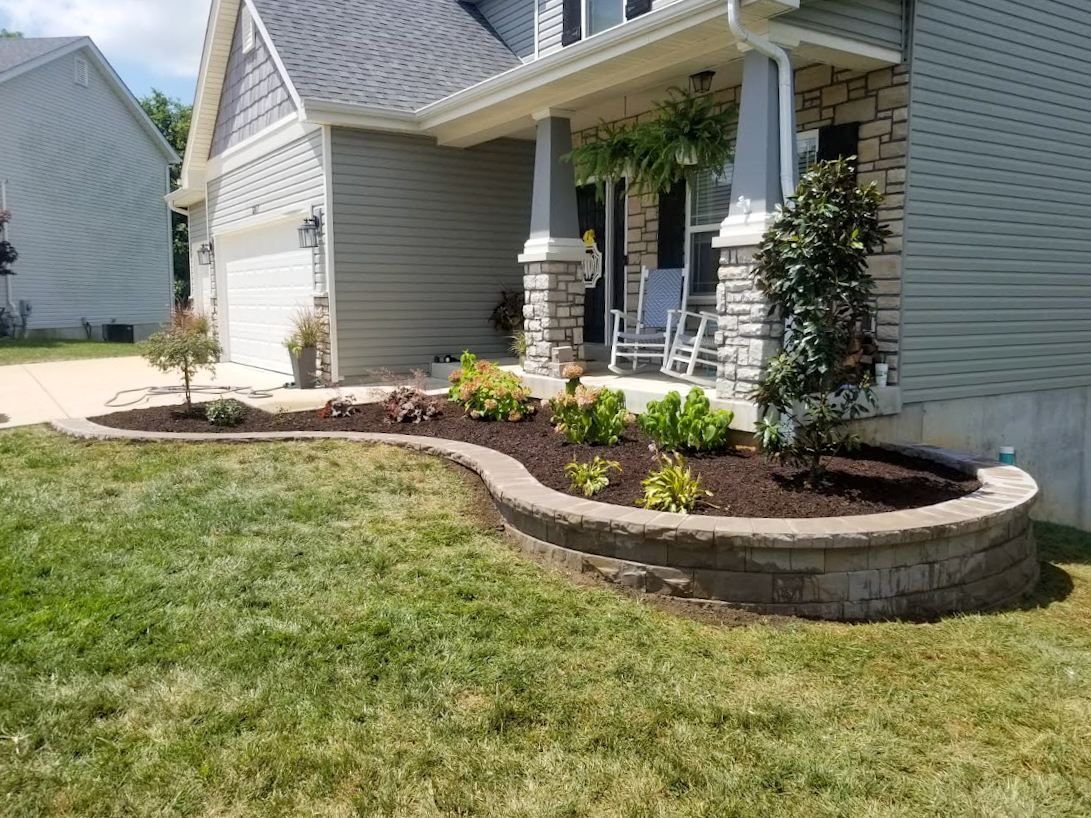 Photograph: block wall with new lawn above