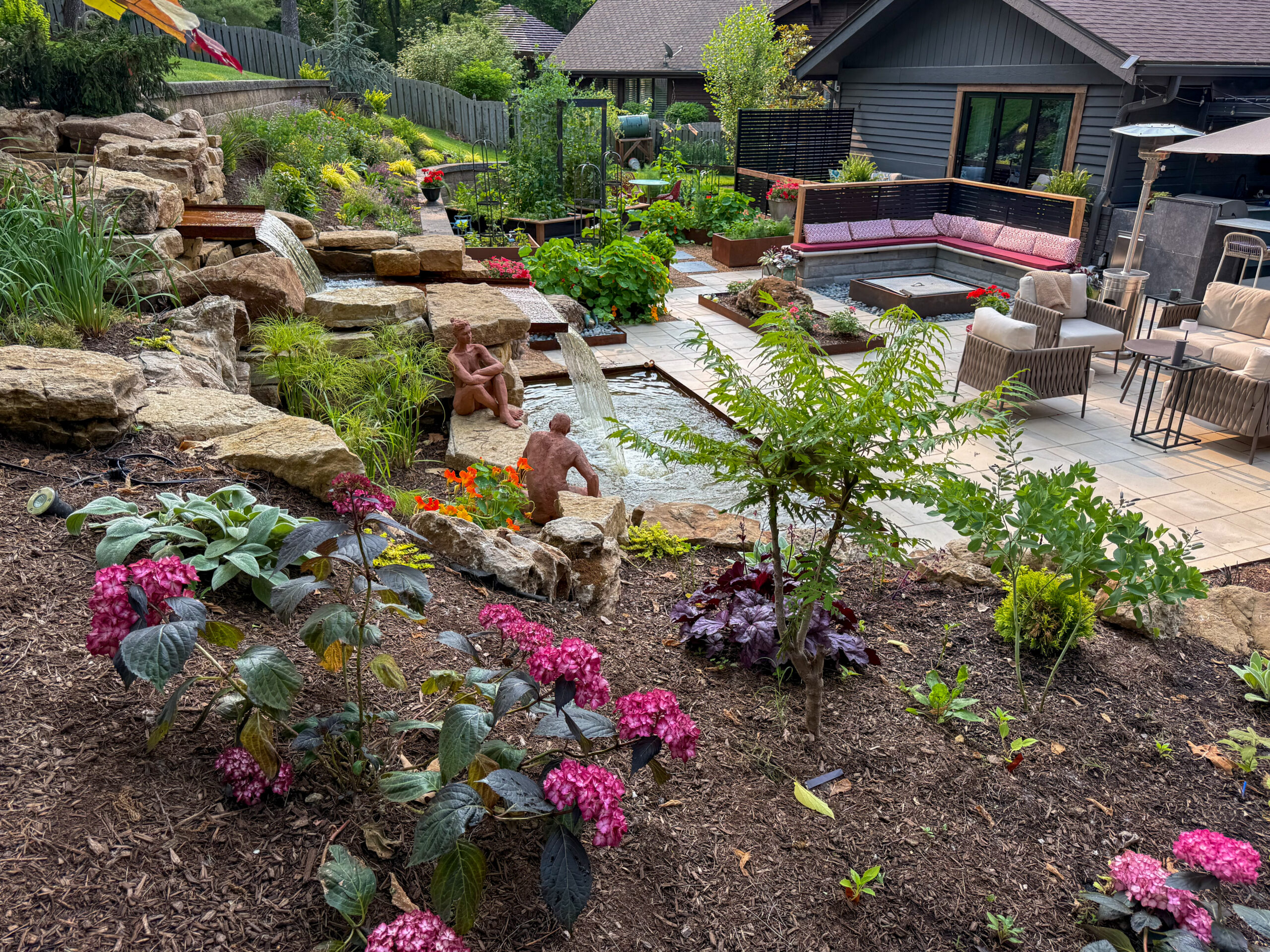 Stone patio beside a garden in St. Louis